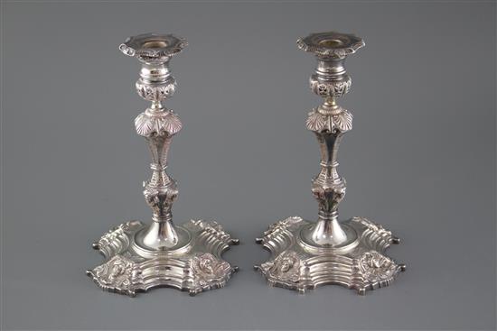 A pair of modern 18th century style Irish cast silver candlesticks, by Royal Irish Silver Co. Dublin, 1960, height 23.5cm, 69oz.